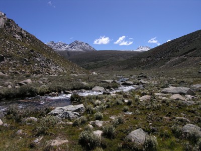 High valley Stream and mountain on Tibetan plateau