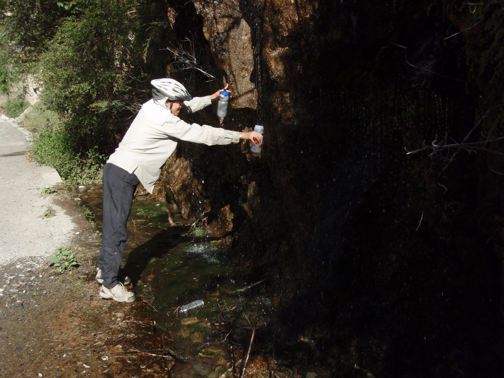 Gathering water Claire getting water from a seep in China