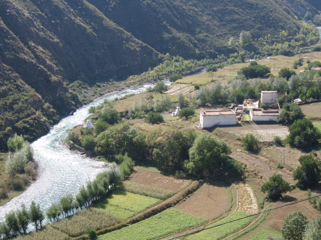 Farm in China along river Farm in China along river